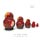 Side view of a hand-painted round Russian nesting doll set with five red floral Matryoshka dolls arranged from largest to smallest on a white background.