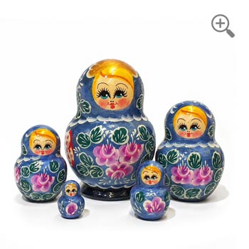 Hand-painted blue Russian matryoshka nesting dolls set of 5 with pink floral design and green leaves, shown from front and back views. Glossy wooden folk art dolls in graduated sizes with traditional blonde faces, displayed on a white background.